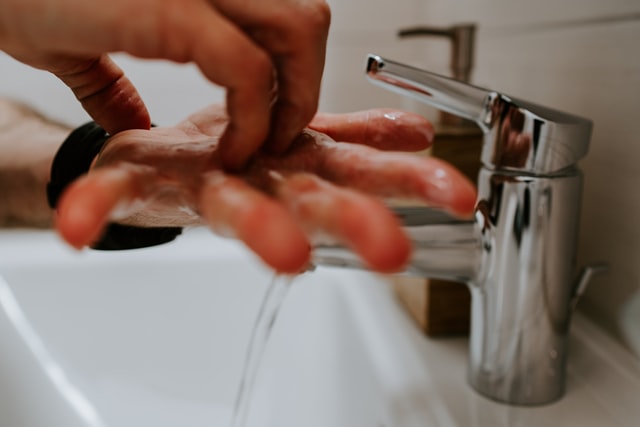 washing hands in basin